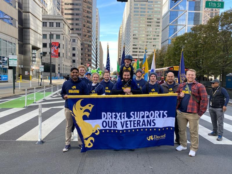 A group of Drexel University veteran students at the Veterans Parade including College of Nursing and Health Professions student Nicholas Eltman.